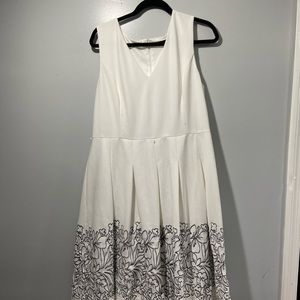 White dress with black embroidery